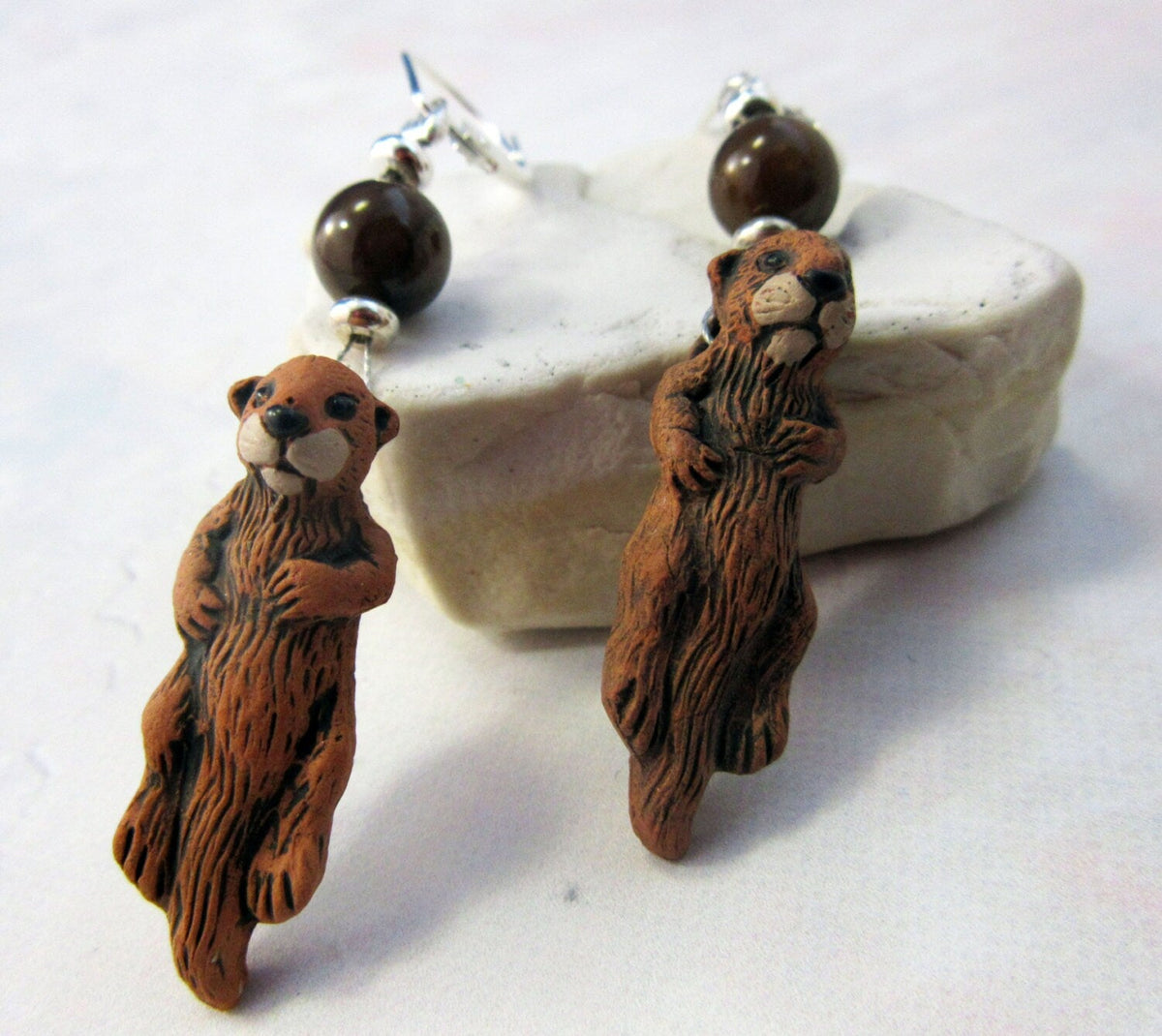 Stylish Otter Earrings - Sea Otter Jewelry with vibrant abalone topper bead, perfect for animal lovers.