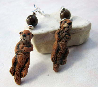 Stylish Otter Earrings - Sea Otter Jewelry with vibrant abalone topper bead, perfect for animal lovers.