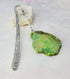 The Impression Jasper Metal Bookmark features a green healing crystal charm in a unique zen design, artisan handcrafted with a detailed pattern. Presented on white with a small stone, it comes gift-boxed—perfect for book lovers.