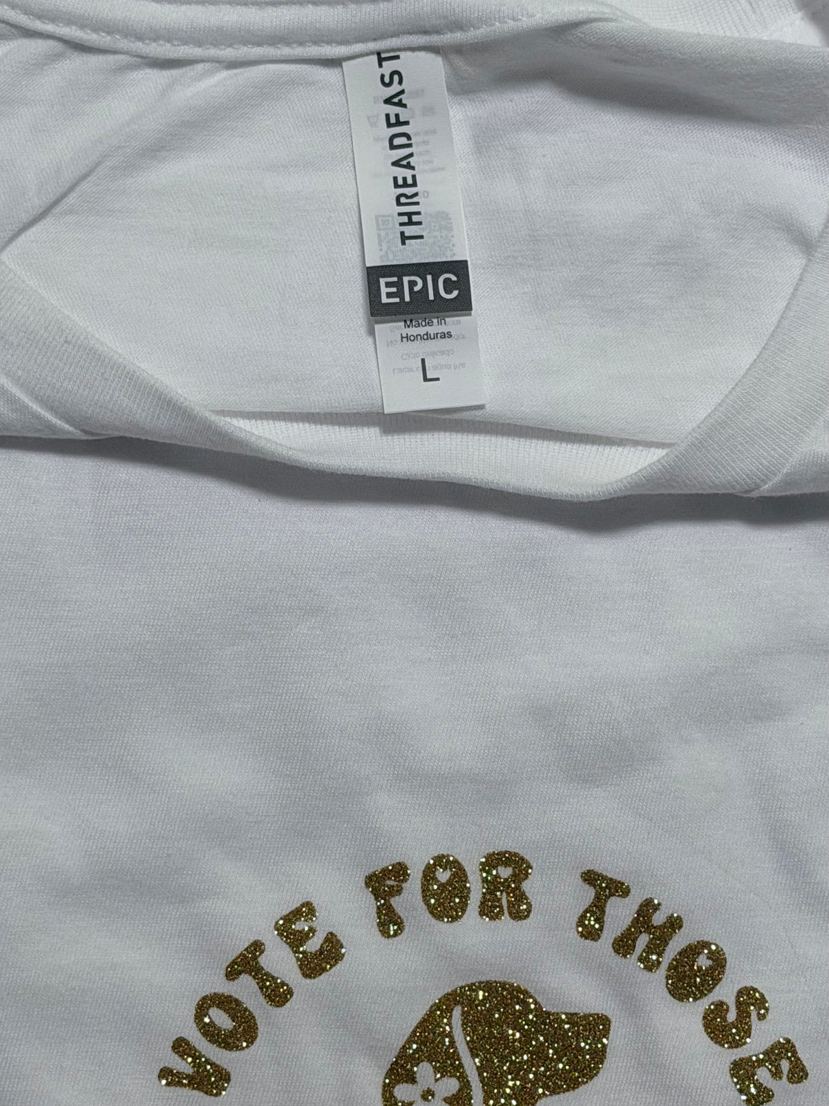 Vote for Those Who Cannot long sleeve t-shirt, white with gold glitter design