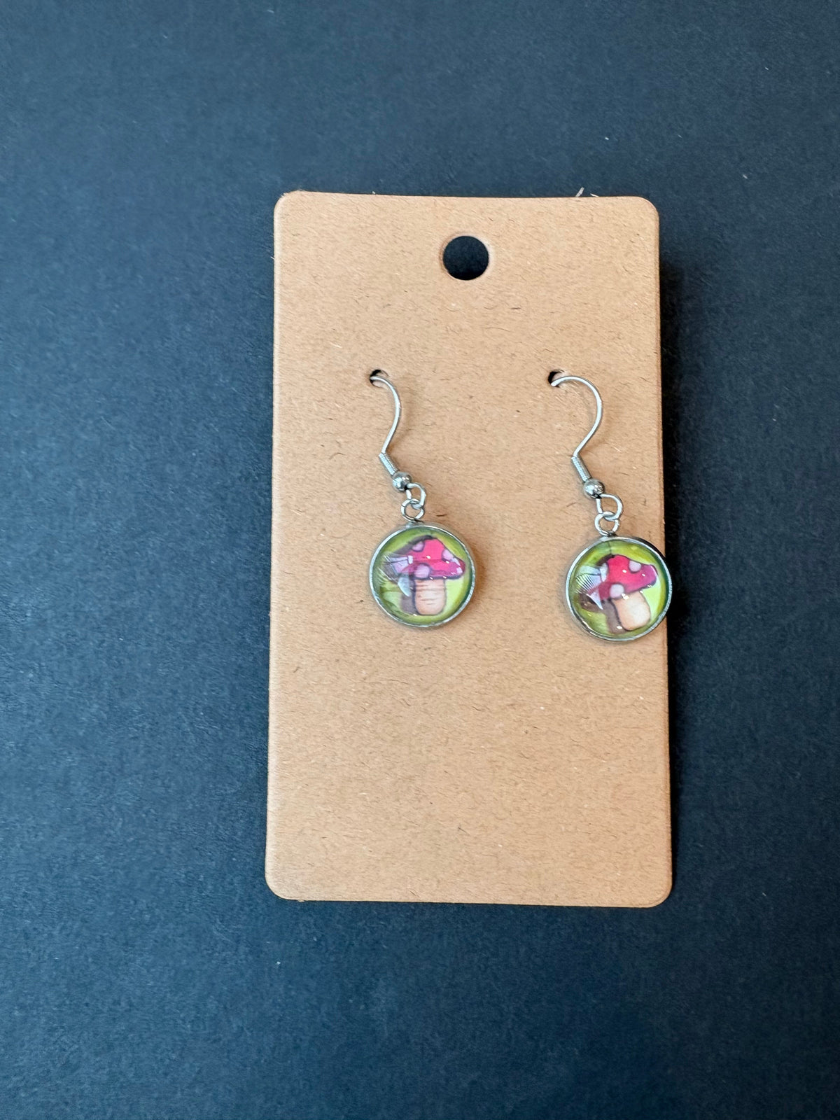 Dangly stainless steel earrings with mushroom design