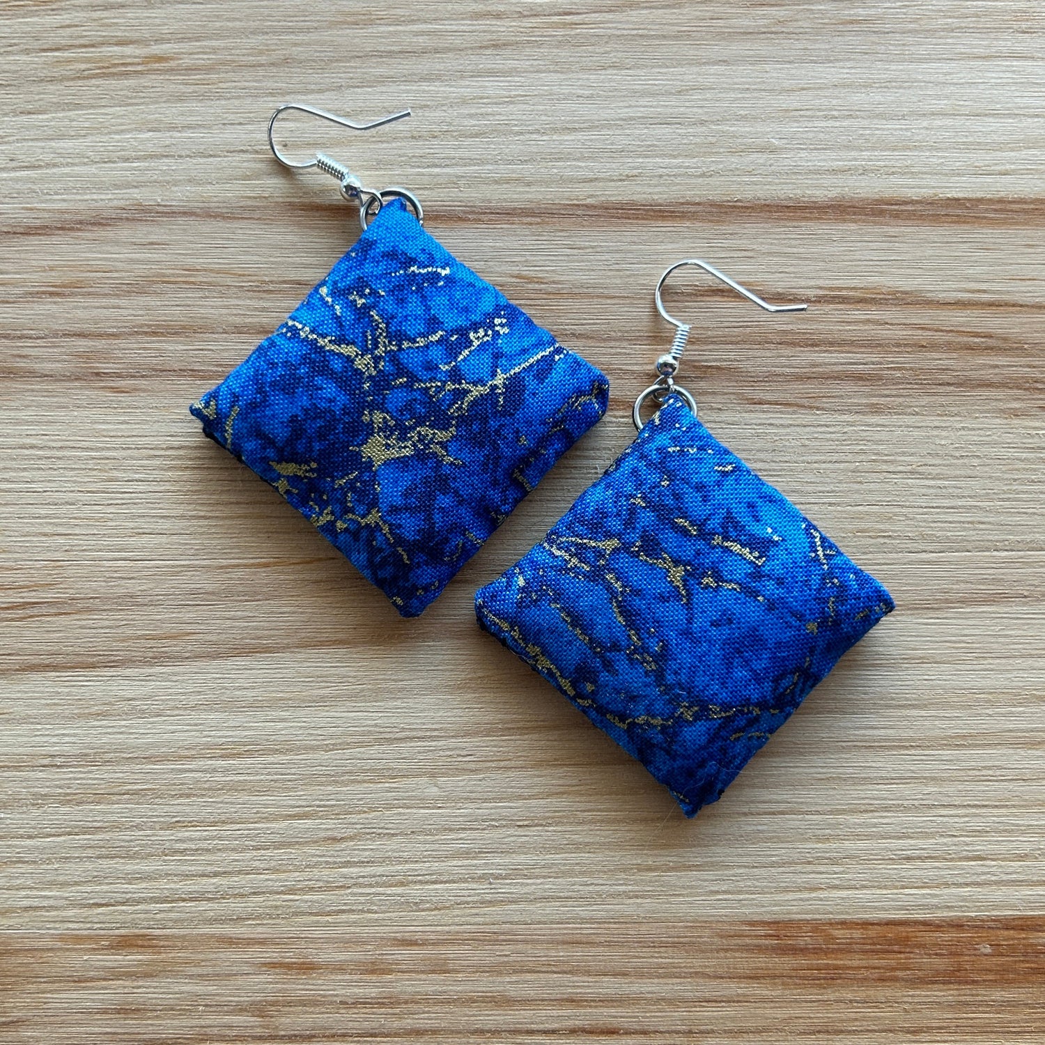 Scandi Snowflake Earrings- gold on dark blue