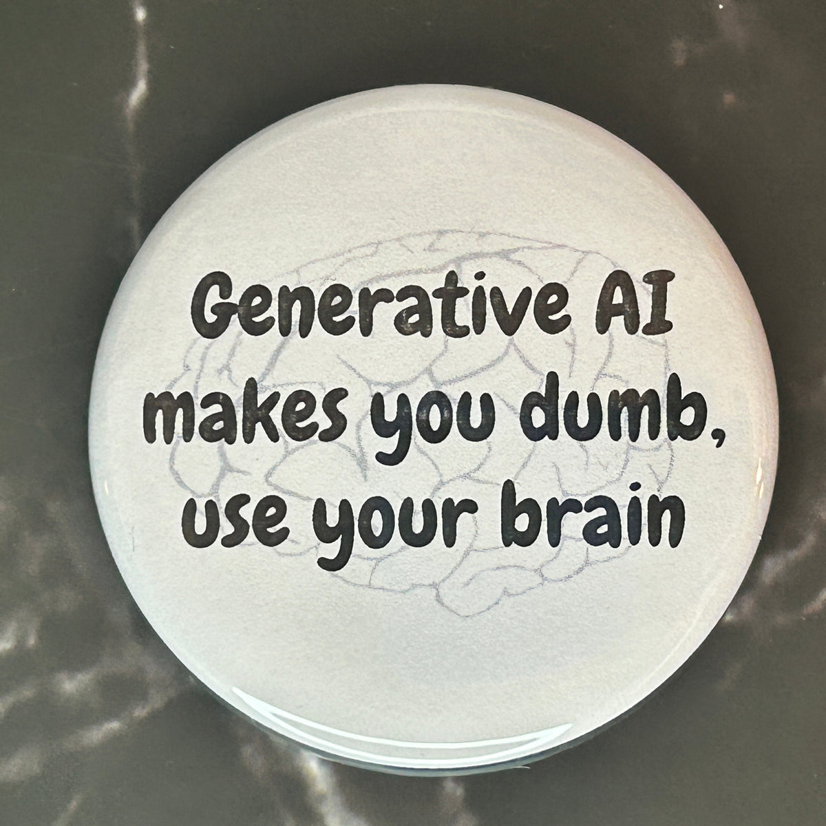 Gen AI makes you dumb - button/magnet/mirror