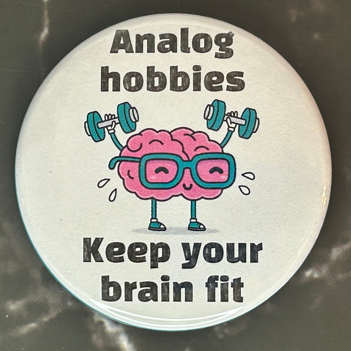 Analog hobbies keep your brain fit -  button/magnet/mirror