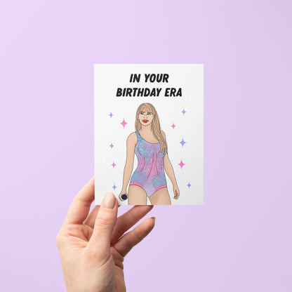 In Your Birthday Era greeting card flat lay — pastel illustrated birthday card by indie artist MangoIllustrated