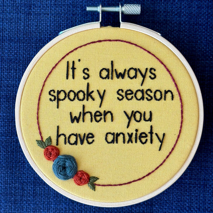 Embroidery hoop reads, "It&