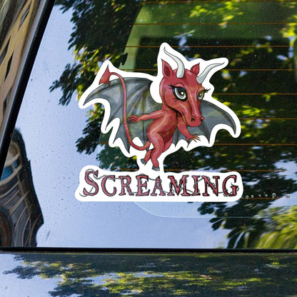 Jersey Devil cryptid sticker on the rear window of a car with trees reflected behind