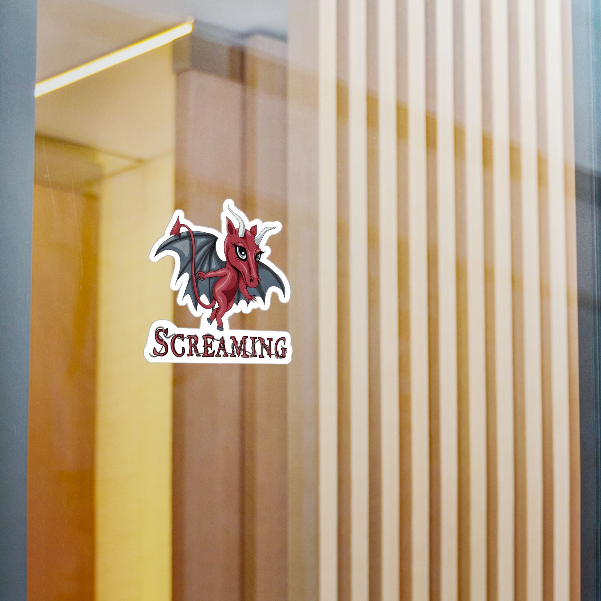 Medium Jersey Devil cryptid sticker on a glass window in a modern interior