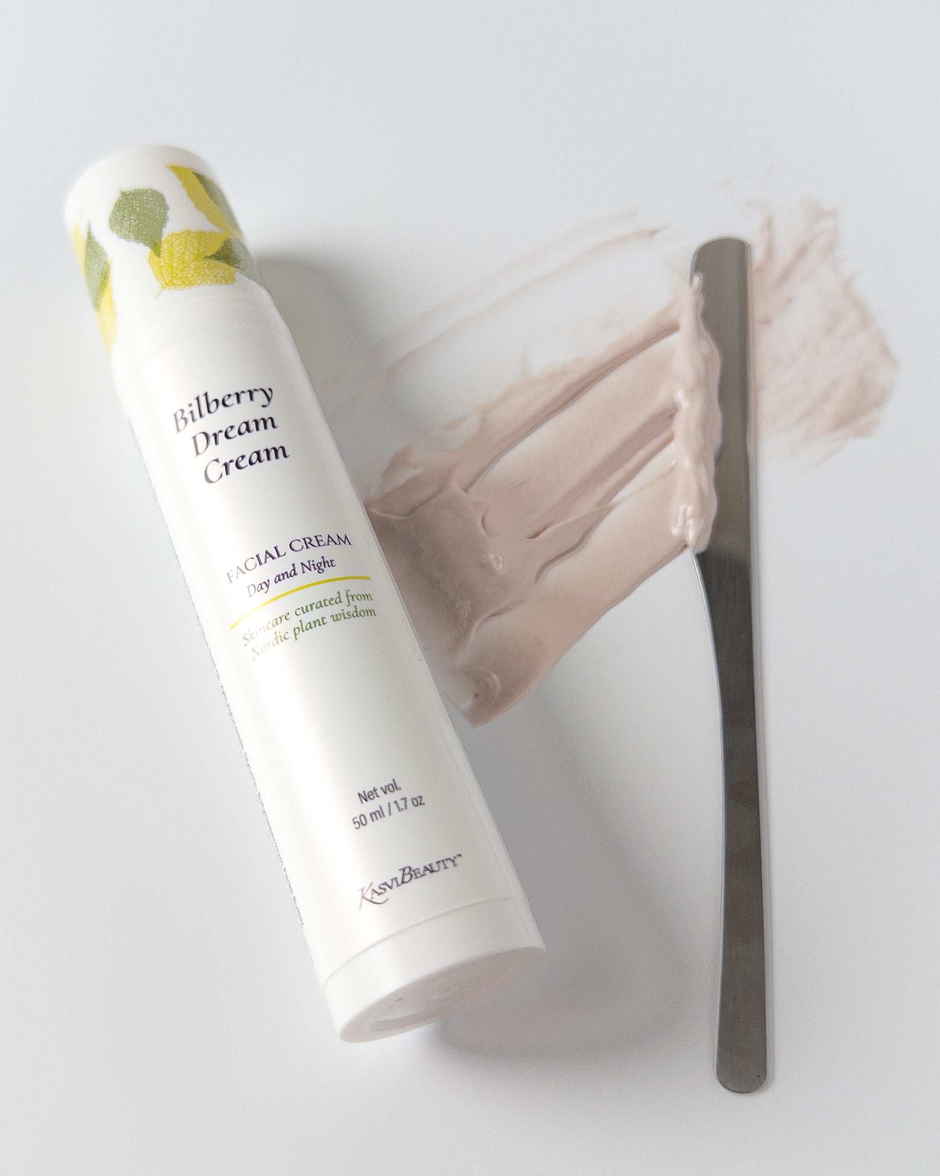 Kasvi Beauty Bilberry Dream Cream Facial Cream for Am and PM use with a moisturizer swoosh on white background.