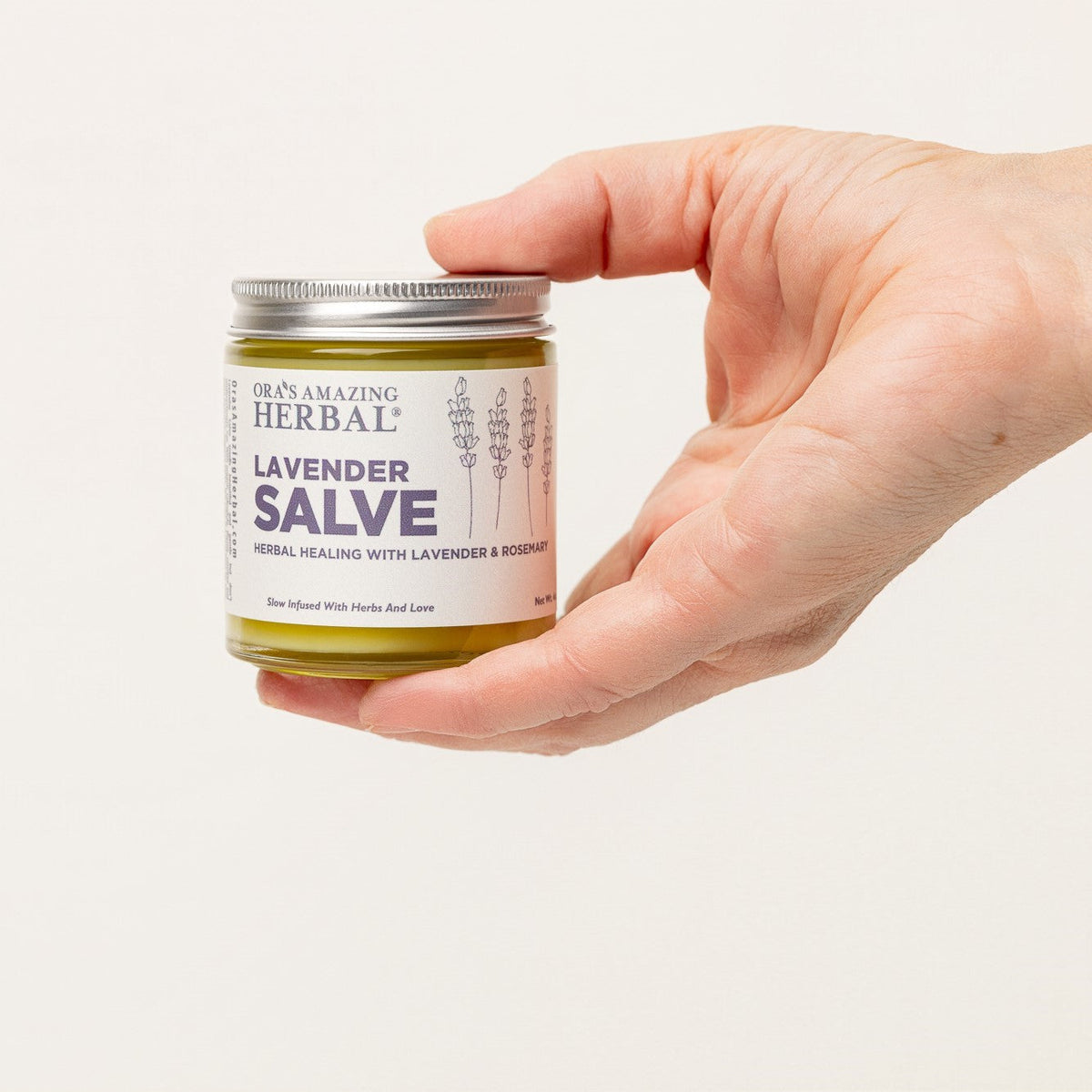 Lavender Salve 4oz Lifestyle Indoor Hold By Human Hand