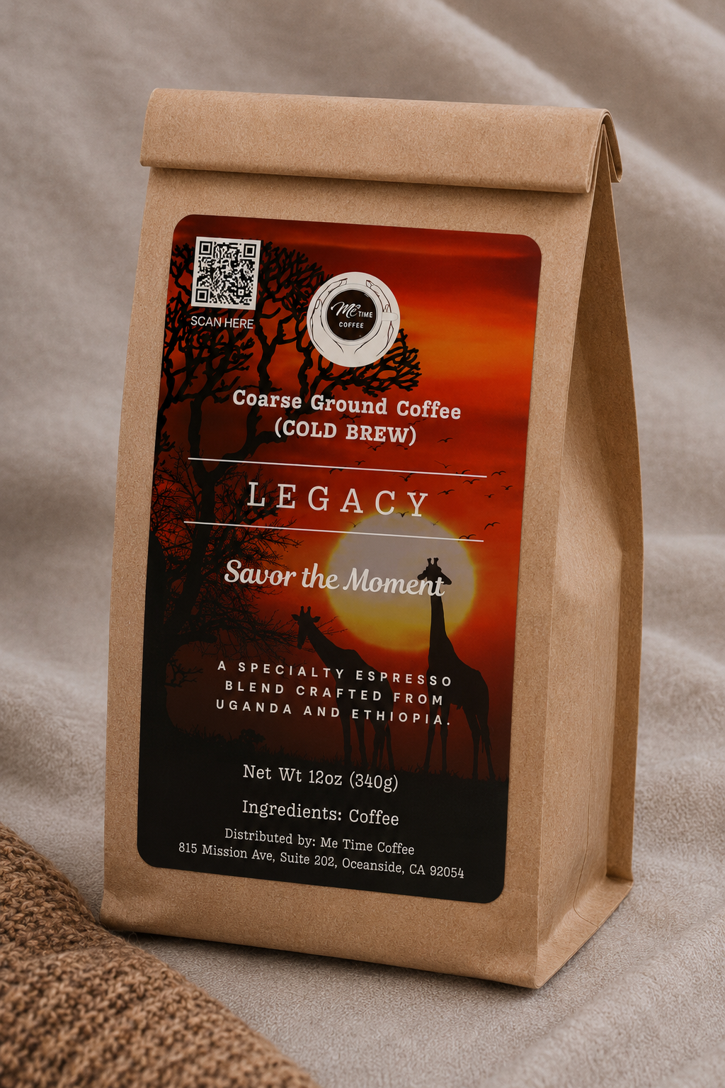 A kraft paper coffee bag labeled Legacy Coarse Ground Coffee (Cold Brew) by Me Time Coffee, set against a neutral beige fabric background.