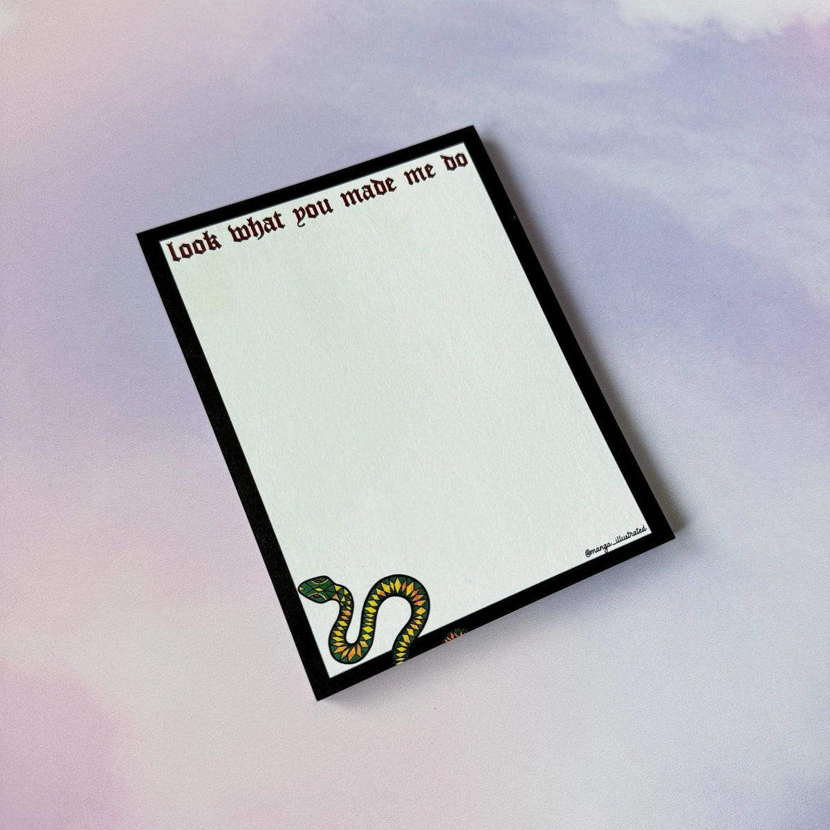 Look What You Made Me Do notepad — green snake with ruby eyes and gold detail in dark red lettering on black, 4x5.5 inches, by MangoIllustrated