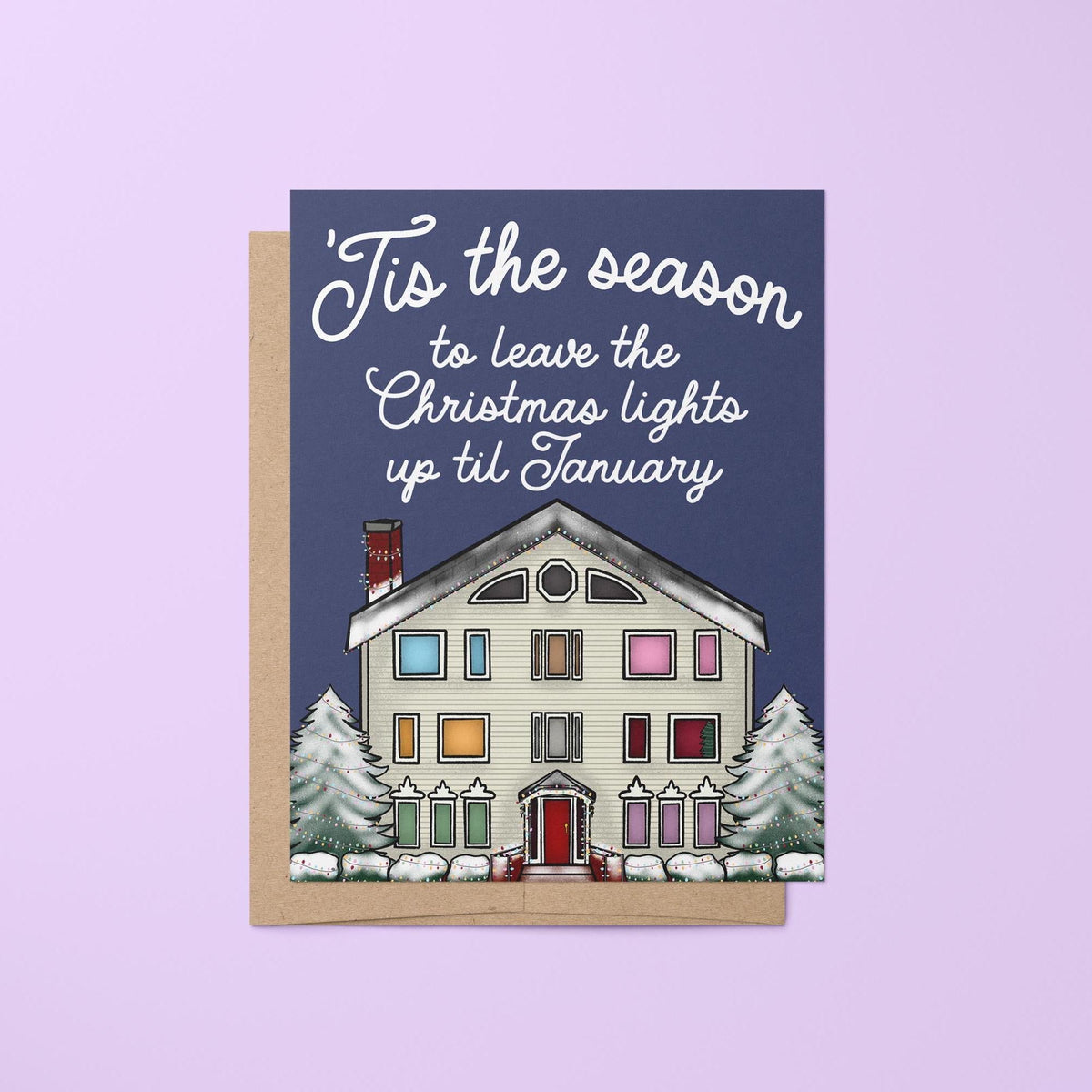 Lover House Christmas card — illustrated pastel house strung with Christmas lights and dusted with snow under a hand lettered greeting, 4.25 x 5.5 in folded, by MangoIllustrated