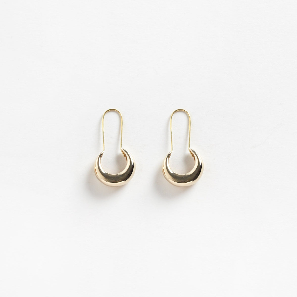 Lua handmade gold hoop earrings by Pichulik, ethical artisan jewelry brand worn by Michelle Obama, sustainable jewelry Cape Town South Africa