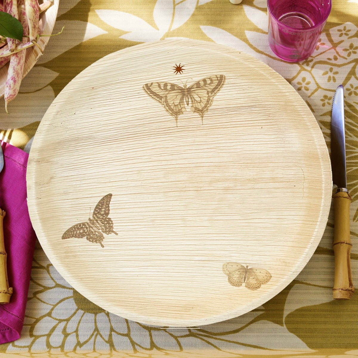 maaterra compostable palm leaf plate with Butterfly Wreath design