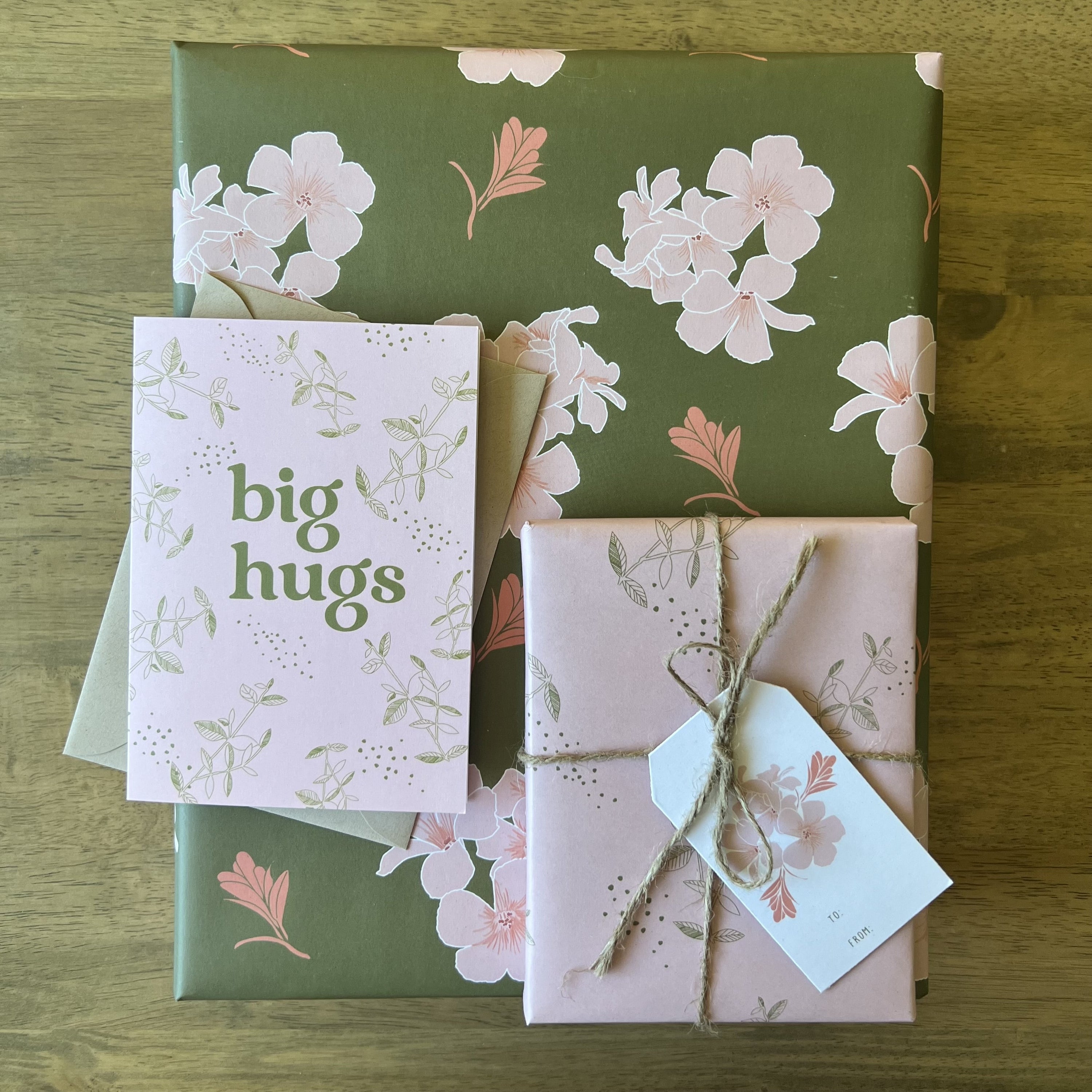 Matching gift wrap and stationery in olive color with pink flower illustration