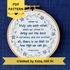 PDF pattern created by Kate, not AI. "When we truly see each other, when we strive to bring out the best in ourselves and one another, oh, there is no limit to how high we can go. Michelle Obama." Quote hand embroidered in dark blue. Text is surrounded by floral wreath of periwinkle blue forget-me-not flowers and light green stems with light blue buds. Fabric is white-on-white cotton. Displayed as wall art in a light wooden embroidery hoop.