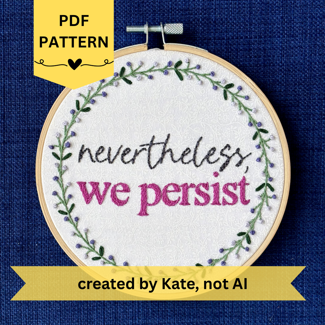 PDF pattern created by Kate, not AI. "Nevertheless, we persist." Nevertheless hand embroidered in a script font in dark gray. "we persist" is in Times New Roman and sewn bright fuchsia embroidery thread. Quote surrounded with a floral wreath with purple and lavender flower buds and green leaves. Stitched on white-on-white cotton. Wall art framed in light wood embroidery hoop.