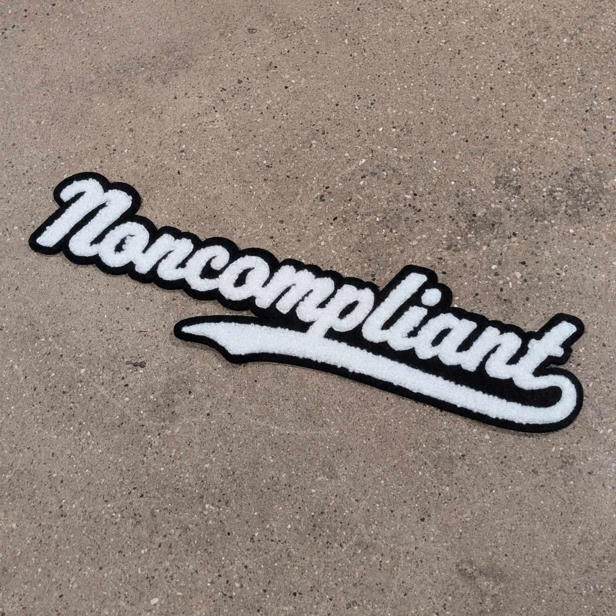 Noncompliant chenille iron-on patch