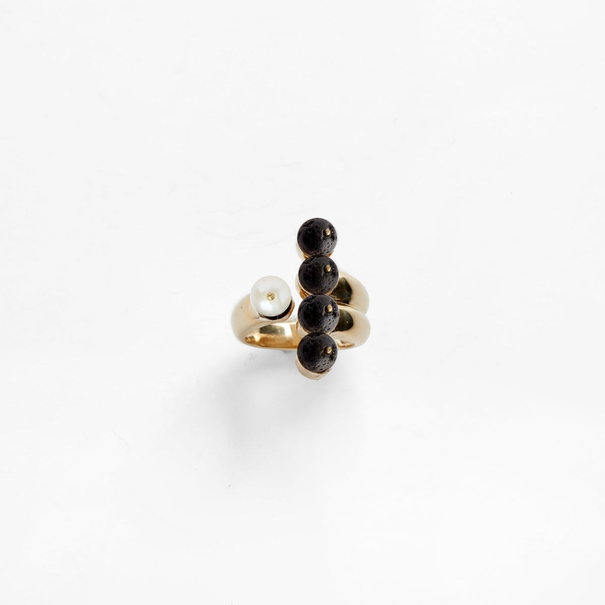 North Star handmade black lava rock and pearl ring by Pichulik, ethical artisan jewelry brand, sustainable handmade jewelry Cape Town South Africa