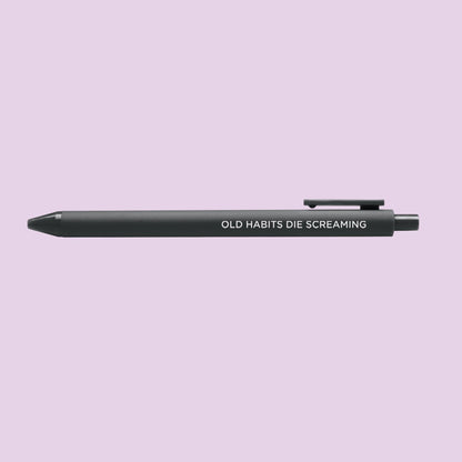 Old habits die screaming jotter gel pen — black barrel with white lettering and black gel ink, 0.5mm, by MangoIllustrated