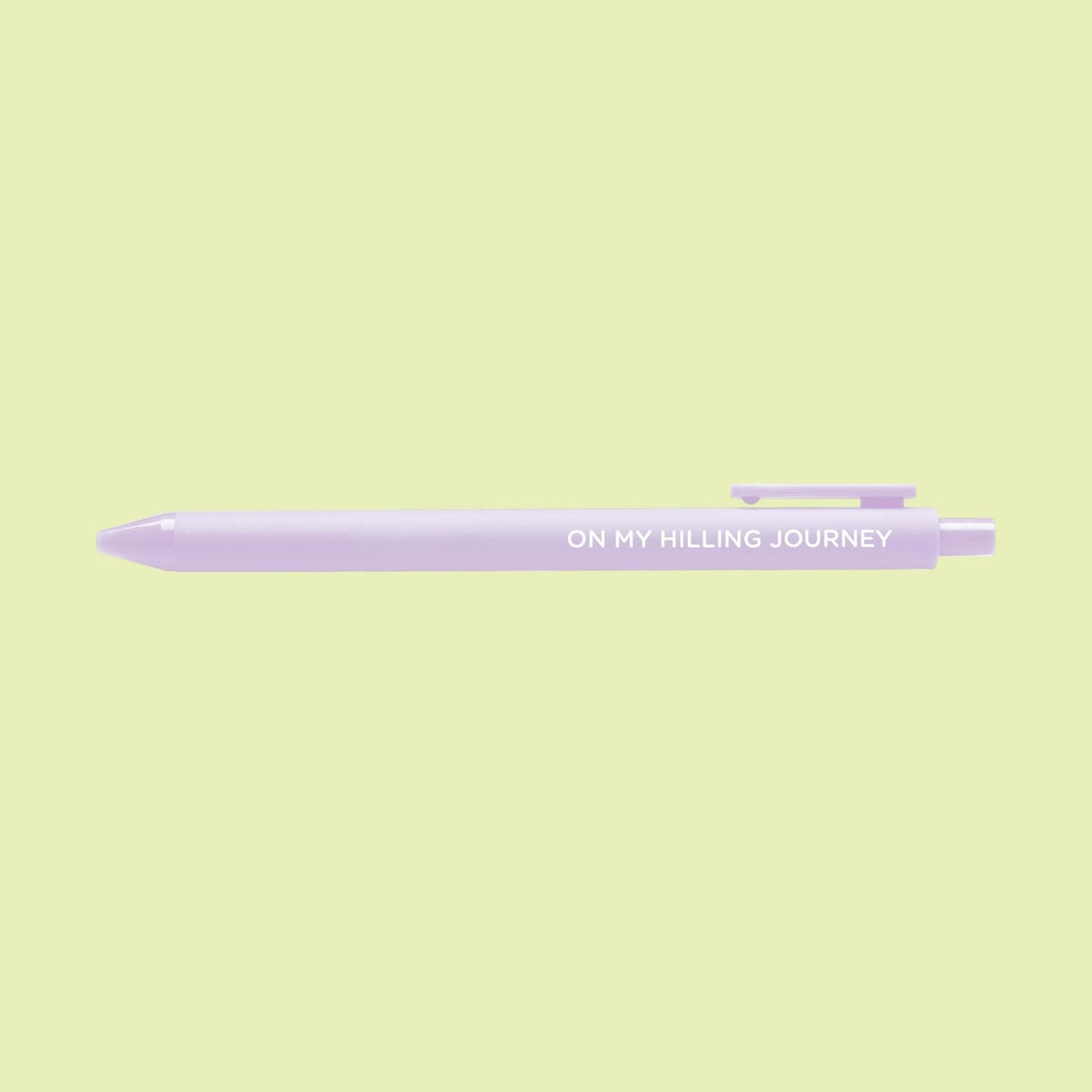 On my hilling journey pen flat lay — lilac quote gel pen with black ink by indie artist MangoIllustrated