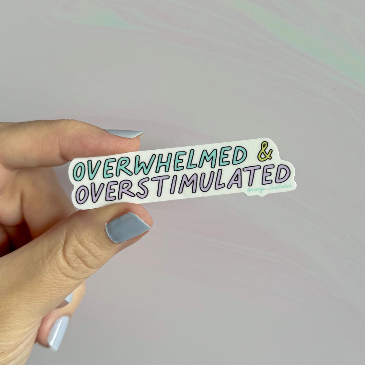 Overwhelmed and overstimulated sticker alternate view — weatherproof vinyl neurodivergent sticker for planners by indie artist MangoIllustrated