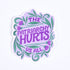 A sticker with a purple background and the text &
