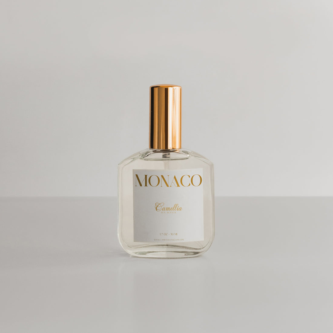 Monaco Perfume by Camellia Lux Scents - 1.7oz clear glass spray bottle with rose gold cap, a luxurious fragrance with notes of jasmine, saffron, and ambergris
