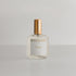Socialite Perfume by Camellia Lux Scents - 1.7oz clear glass spray bottle with rose gold cap, a bold and luxurious fragrance with notes of lychee, Turkish rose, and oud