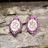 Handcrafted pink framed snake wooden dangle earrings featuring a detailed serpent coiled within an ornate gothic-inspired frame. Lightweight laser-cut wooden earrings with hypoallergenic .925 sterling silver hooks, perfect for snake lovers, gothic fashion, reptile enthusiasts, witchy style, dark academia, and nature-inspired handmade jewelry.