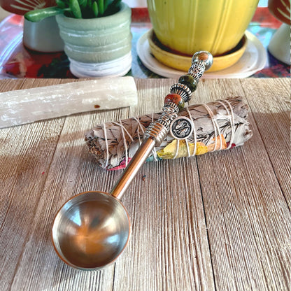 Astro Bowl Spoon designed for tea lovers with zodiac charm and focus stone handle, ideal for scooping loose teas.