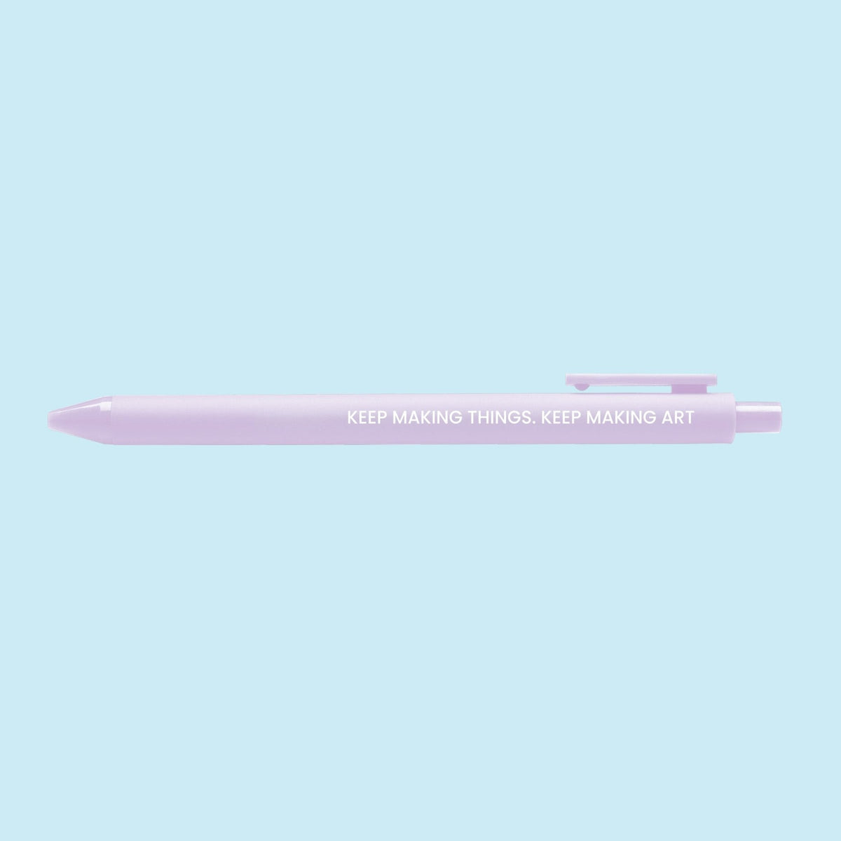 Keep Making Art pen flat lay — lilac affirmation gel pen with black ink by indie artist MangoIllustrated