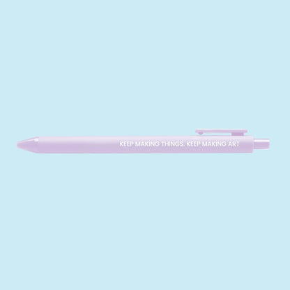 Keep Making Art pen flat lay — lilac affirmation gel pen with black ink by indie artist MangoIllustrated