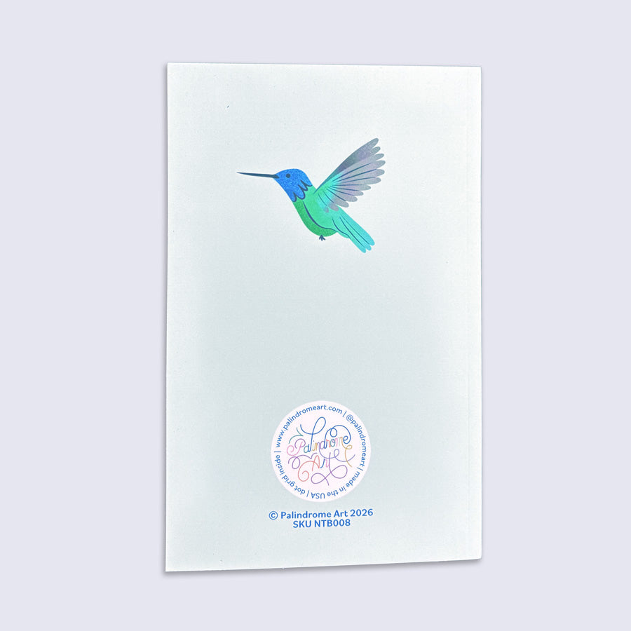 back cover of a journal with a hummingbird illustration
