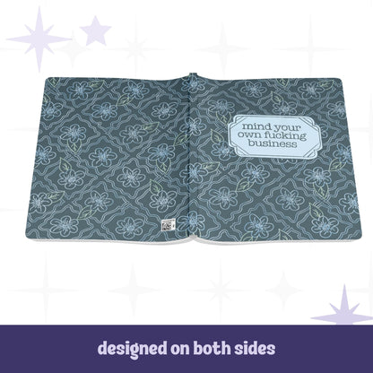 Profanity softcover journal open flat showing full wrap design on front and back covers with teal floral tile pattern and mind your own fucking business label on front