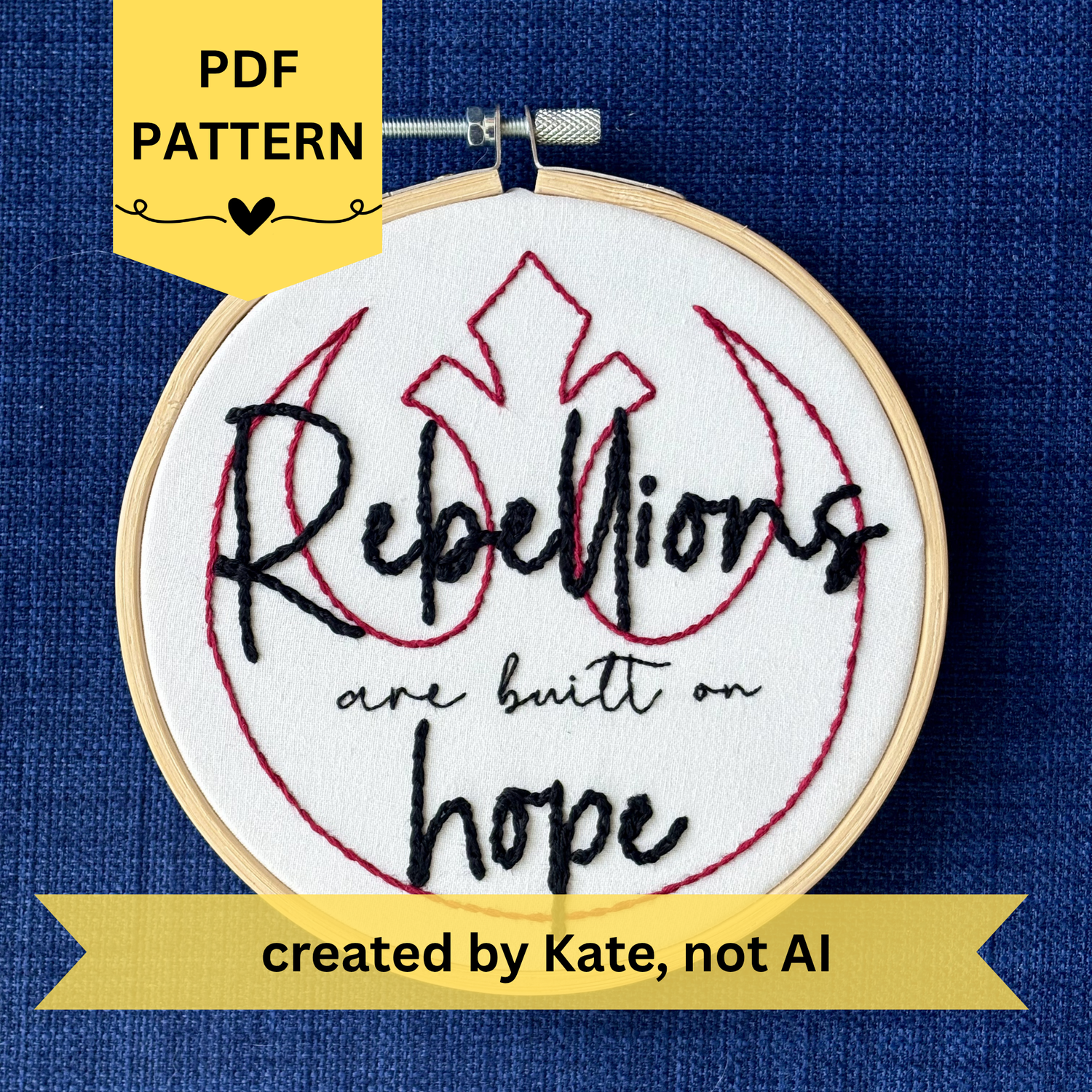 PDF pattern created by Kate, not AI. "Rebellions are built on hope." Text is in two handwriting fonts and hand embroidered in black embroidery thread. Words are centered on top of a red outline of the Star Wars Rebel Alliance symbol. Fabric is white cotton. Framed in light wood embroidery hoop.