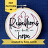 PDF pattern created by Kate, not AI. "Rebellions are built on hope." Text is in two handwriting fonts and hand embroidered in black embroidery thread. Words are centered on top of a red outline of the Star Wars Rebel Alliance symbol. Fabric is white cotton. Framed in light wood embroidery hoop.