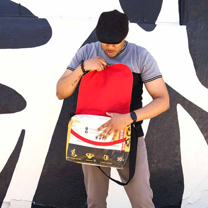 cool guy with cool camel print messenger bag