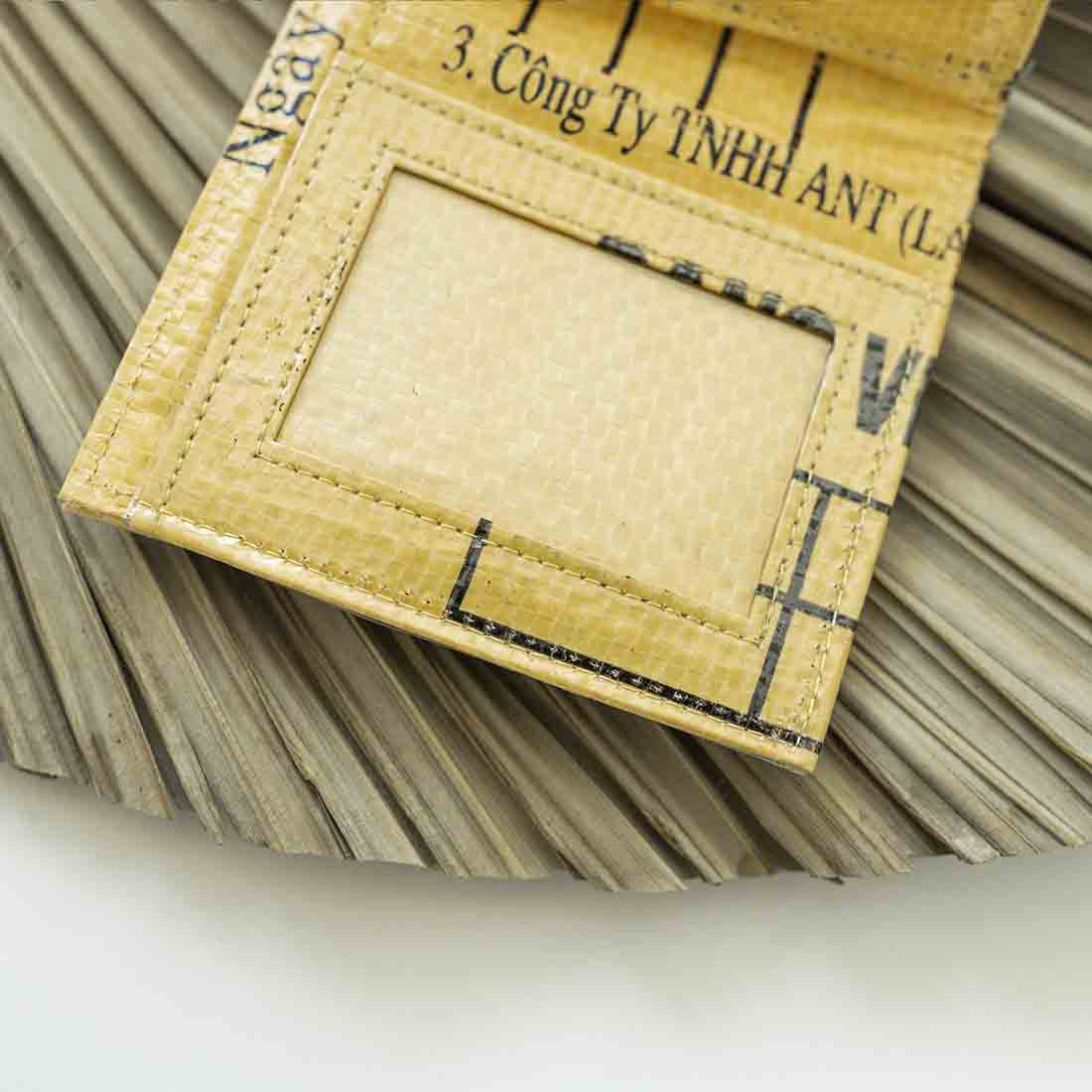 close up of yellow recycled square slim wallet