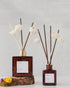 Fig & Grove reed diffuser styled with flower reeds for a bathroom, bedroom, or entryway