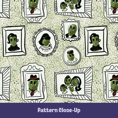 Close-up of retro olive portrait pattern on sage green tea towel showing hand-illustrated olive characters in ornate frames including cameo, fedora olive, family portrait, and bug-eyed olive on terrazzo speckled background