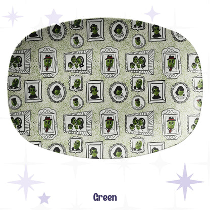 Retro olive portrait serving platter in sage green speckle colorway showing full allover mid-century gallery wall pattern of framed illustrated olive characters on pale sage terrazzo-style ground