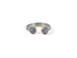 A sterling silver band with diagonal design, and two rose gold bezel set cloudy blue aquamarine stones, ethically made by artisans, flat lay, chicago jewelry online 