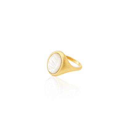 gold etched signet ring with oval faceted mother of pearl stone and an orange blossom and hatched motif on the back. fair trade jewelry online in chicago 