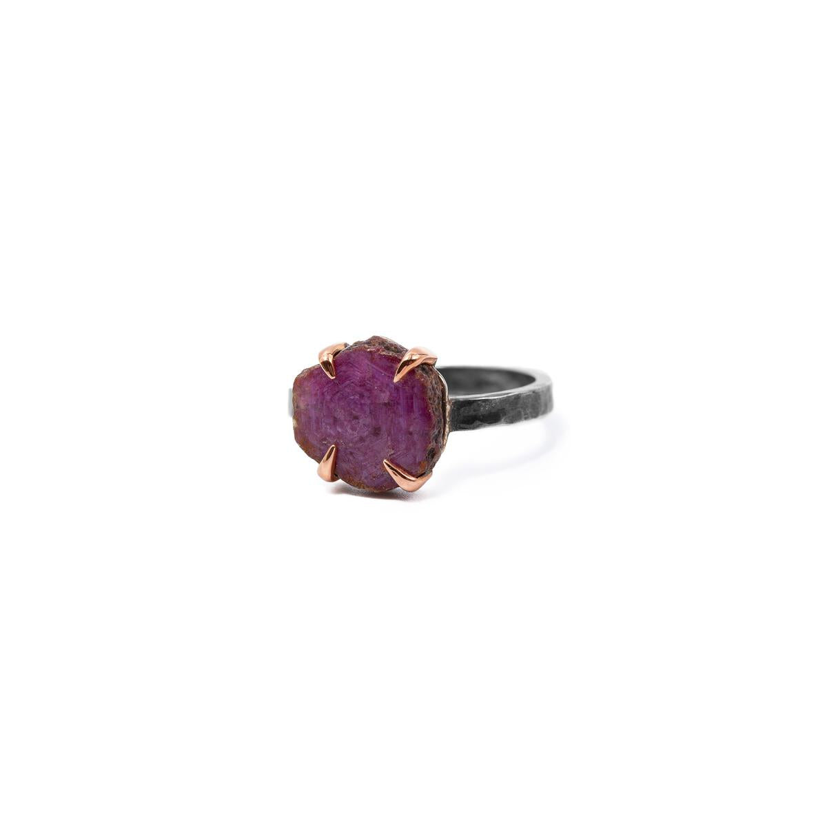 Rough ruby gemstone handmade in Mexico, with 10k rose gold prongs and oxidized silver hammered band, made of recycled metals