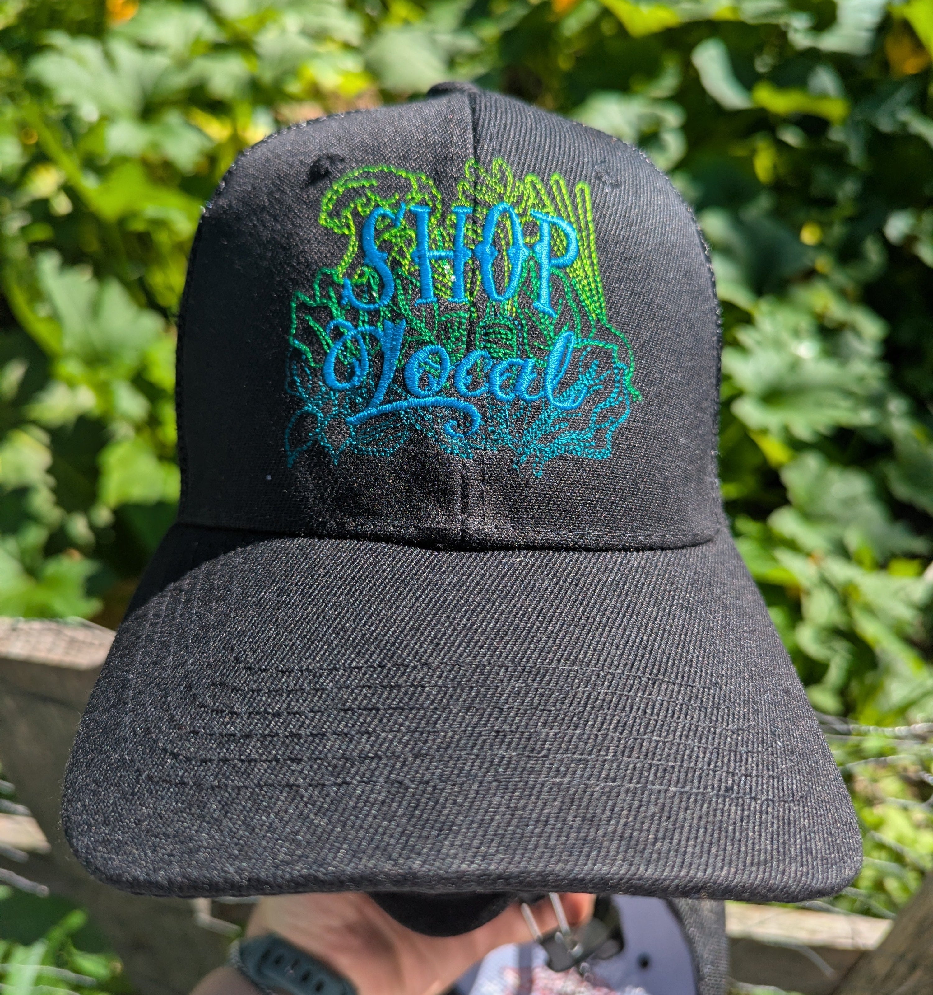 A black baseball cap with &