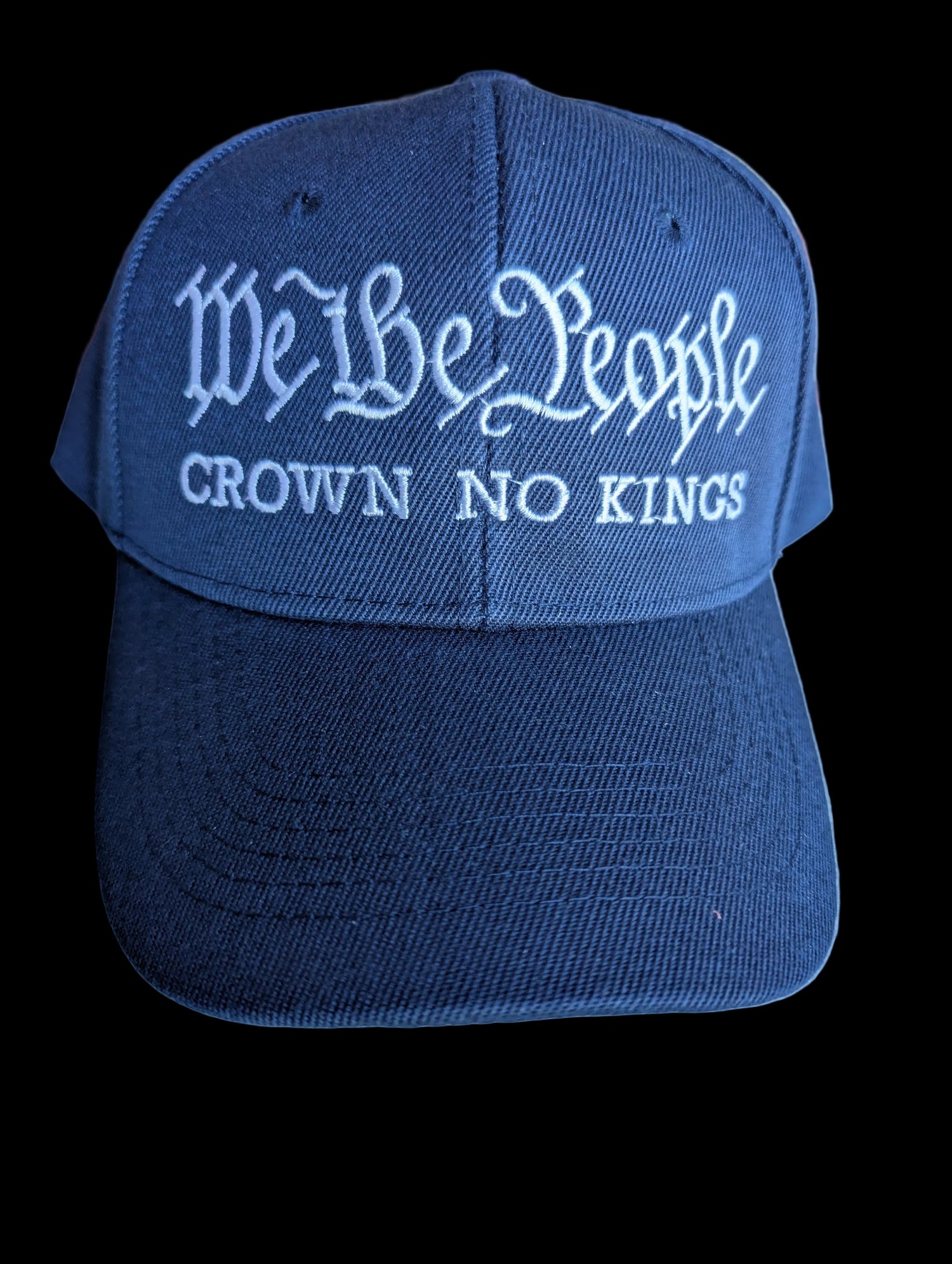 Navy blue cap with white text &
