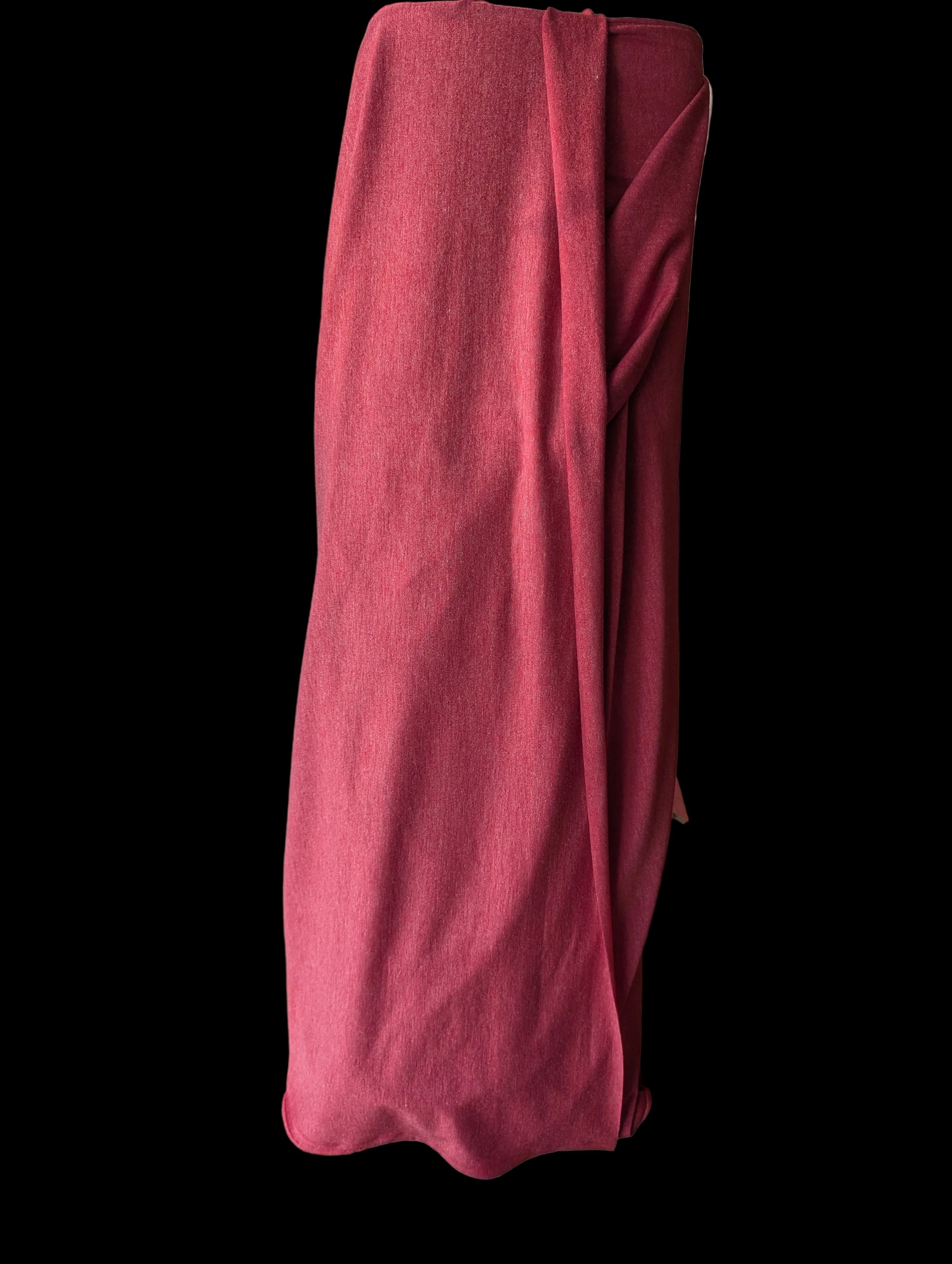Vintage T-shirt weight cotton spandex in a red tomato color, draped off the bolt. 