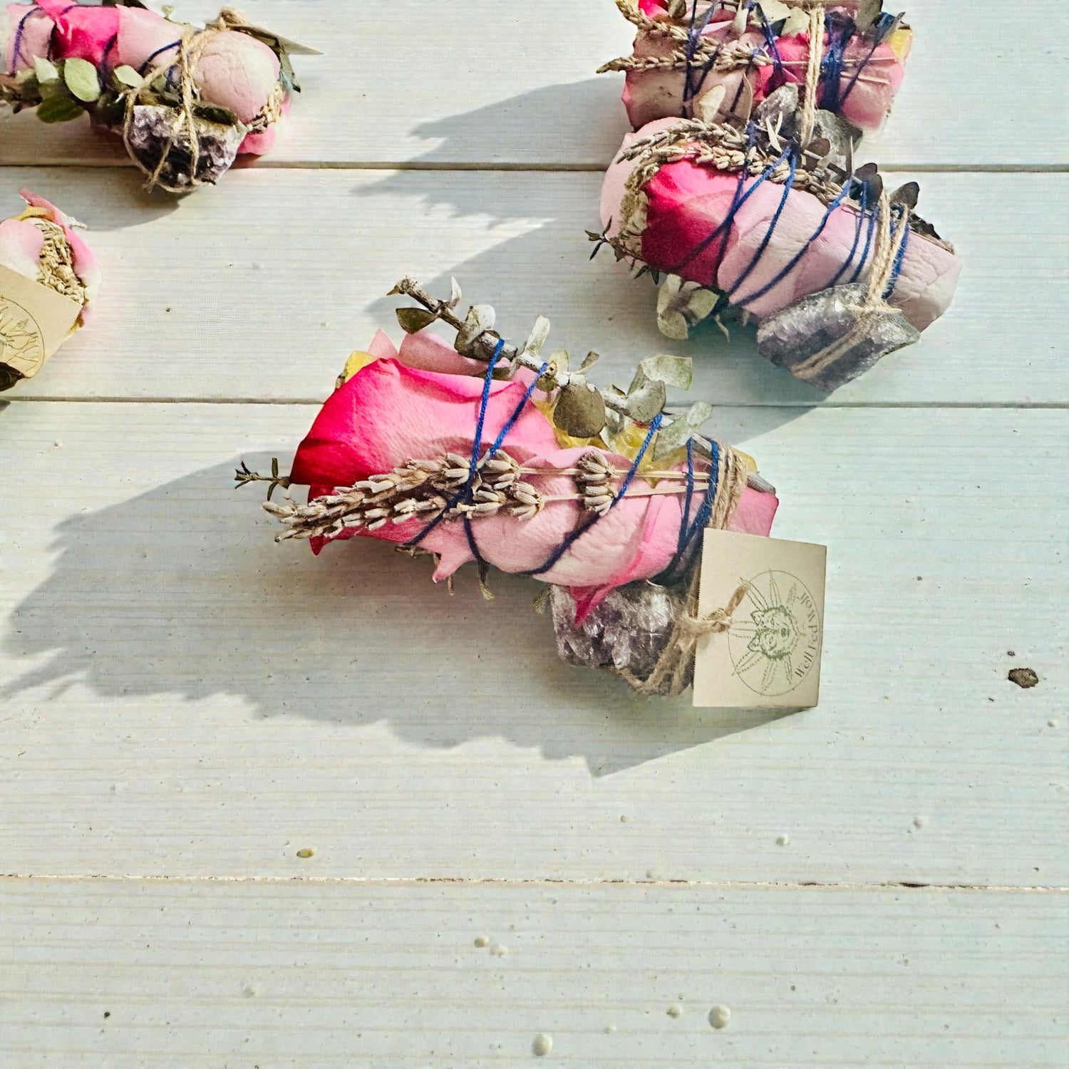 sage with rose petals lavender and amethyst crystals
